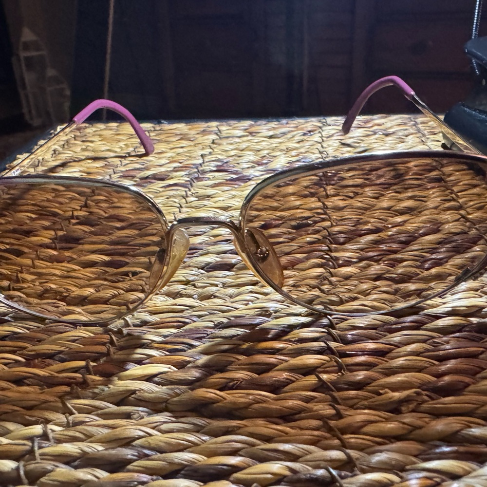 By CHRISTIAN DIOR -Stylish, gold tortoise colored sunglasses.